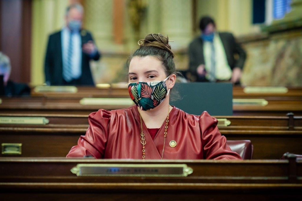 Rep. Jessica Benham sits at her desk in Pennsylvania's Capitol