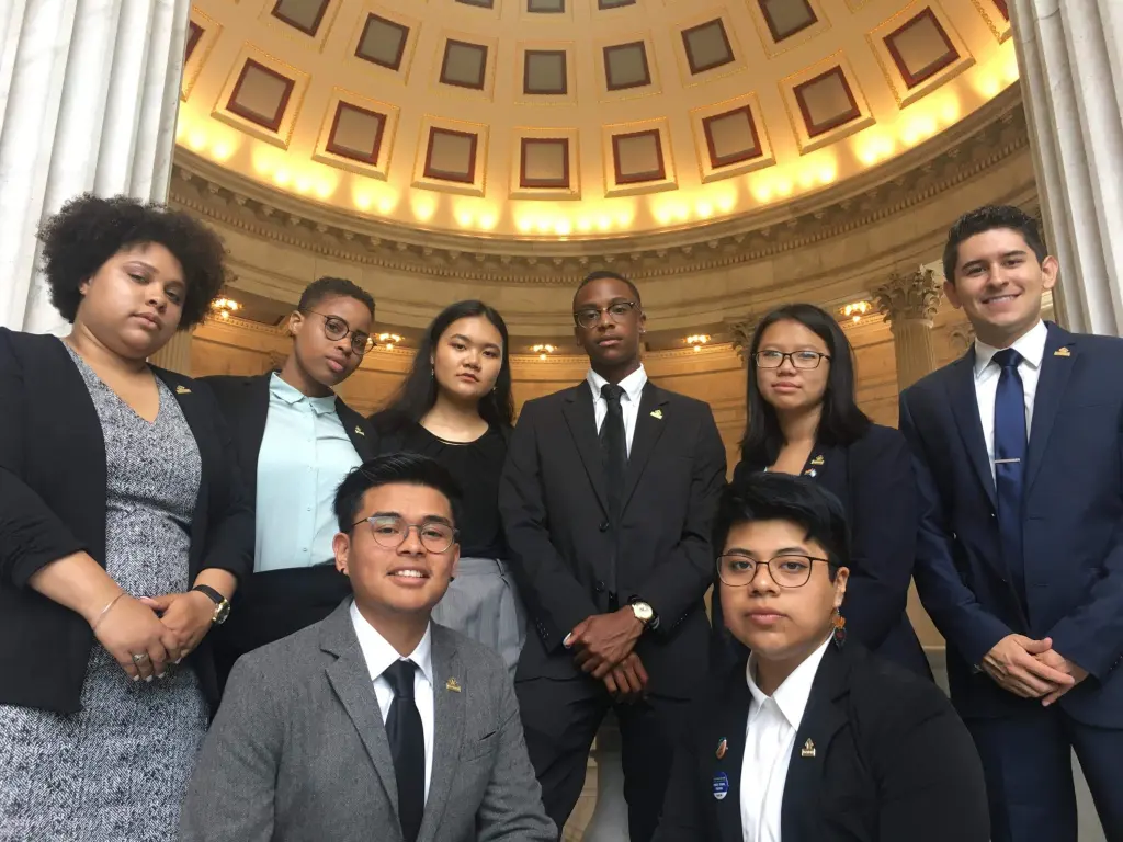 Eight Victory Congressional Interns pose for a group photo