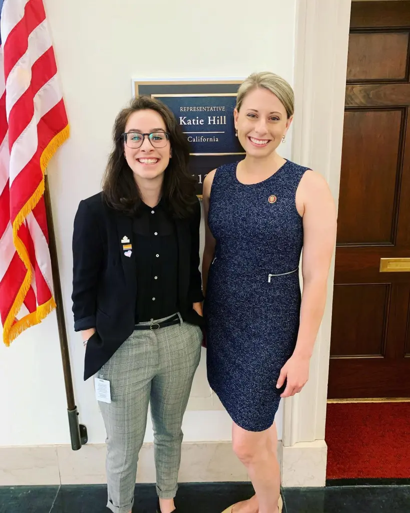 Aliya Bean poses with Representative Katie Hill