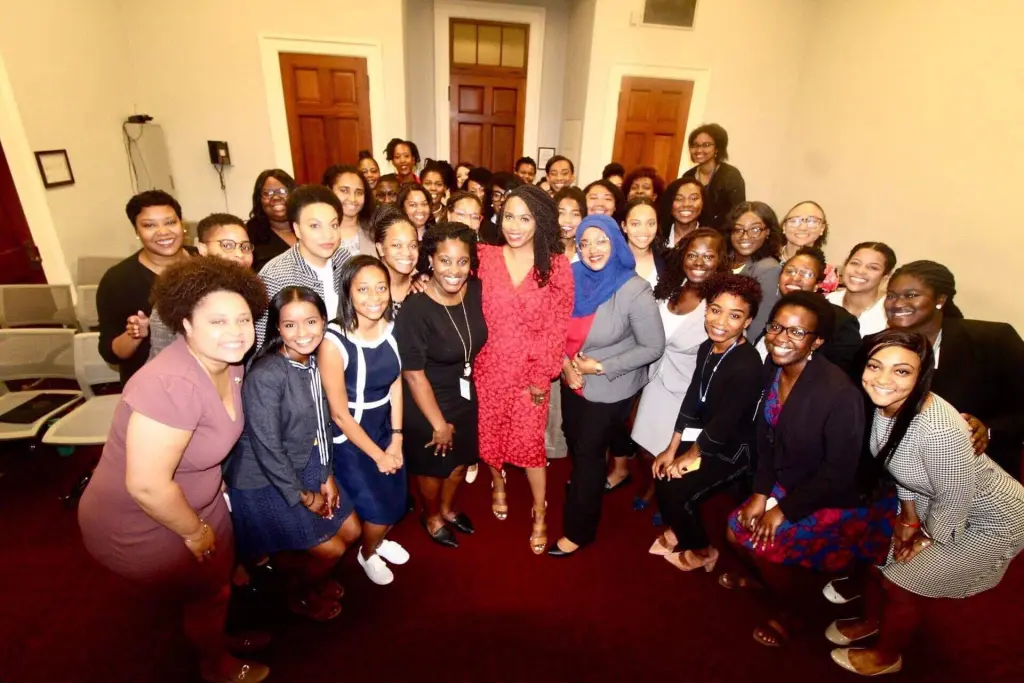 Congressional Interns pose with Representative Ayanna Pressley