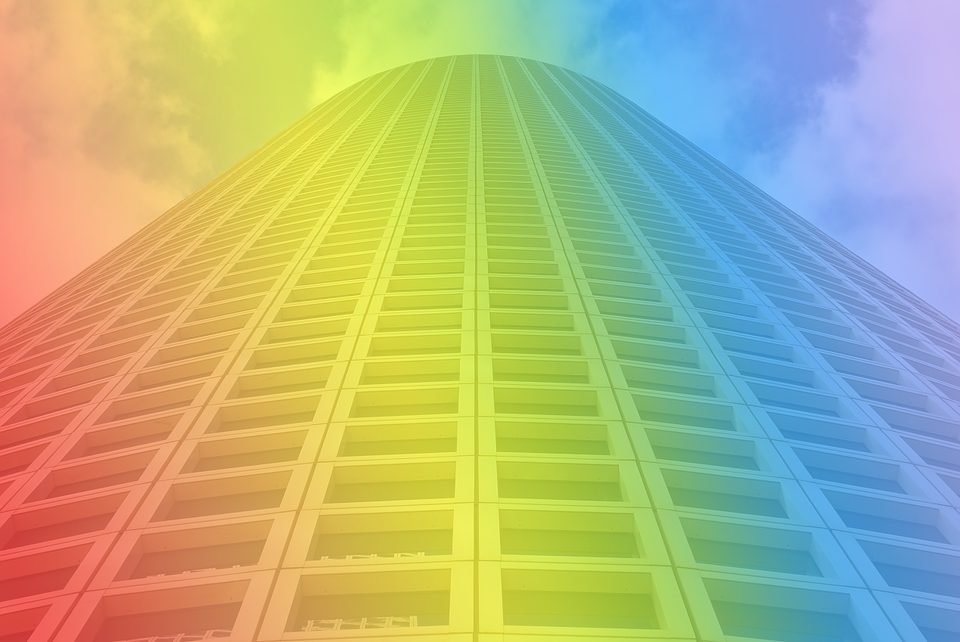 A building covered in a rainbow filter