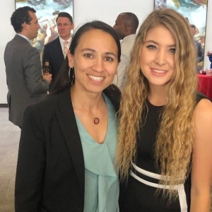 A Victory Congressional Intern poses with Representative Sharice Davids