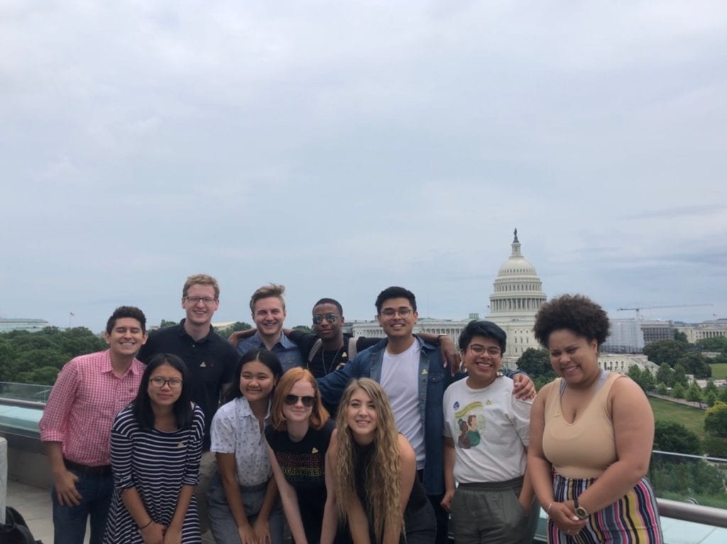 The Victory Congressional Interns pose for a photo in front of the Capitol Building