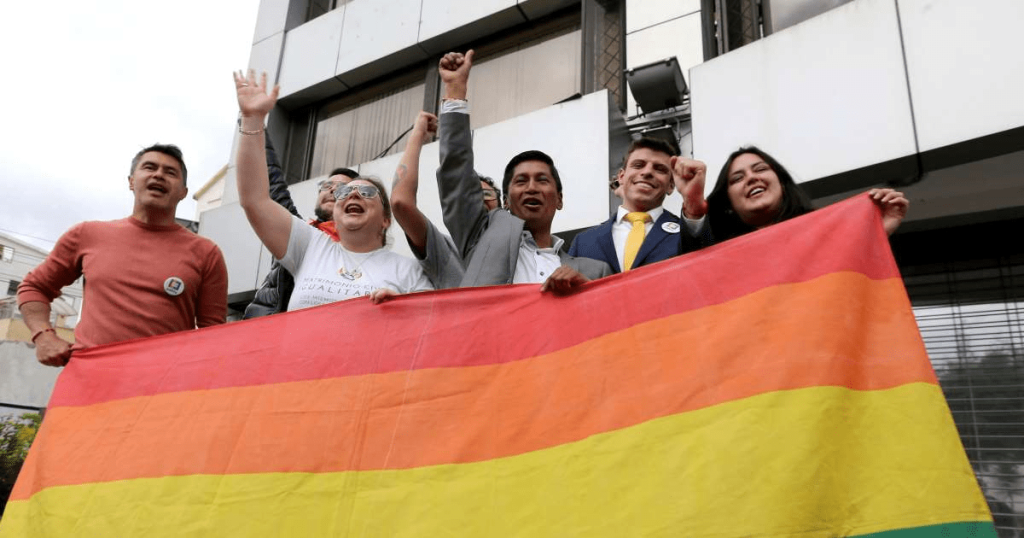 Efrain Soria and other LGBTQ leaders celebrate the legalization of same-sex marriage in Ecuador