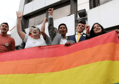 Efrain Soria and other LGBTQ leaders celebrate the legalization of same-sex marriage in Ecuador