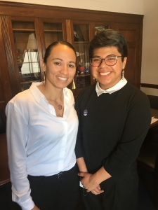 A Victory Congressional Intern smiles for a photo with Representative Sharice Davids