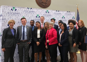 The 12 Victory Congressional Interns pose for a photograph with Senator Tammy Baldwin and Mayor Annise Parker 