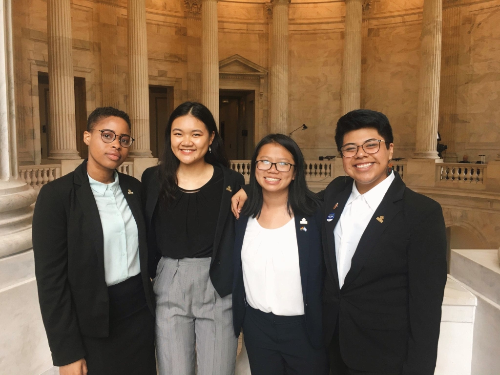 Four Victory Congressional Interns, all nonbinary, pose for a group photo in the Russell Senate Building