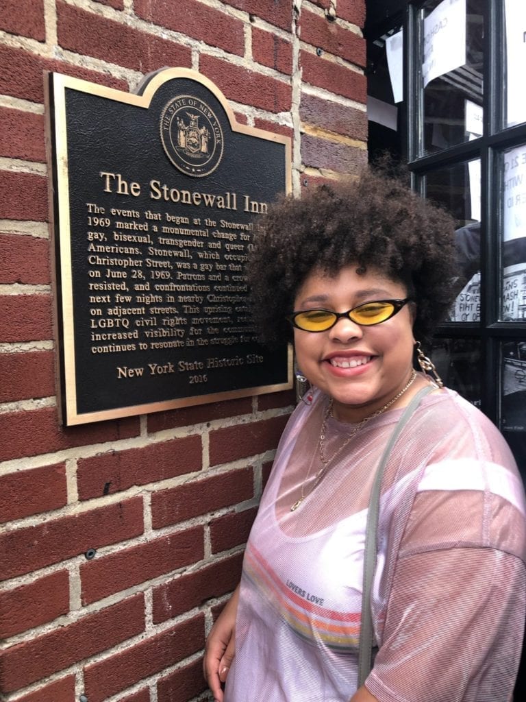 Janiah Miller, Victory Congressional Intern, poses in front of the Stonewall Inn